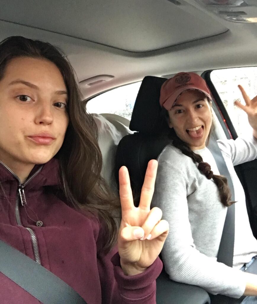 dee and leah in rental car