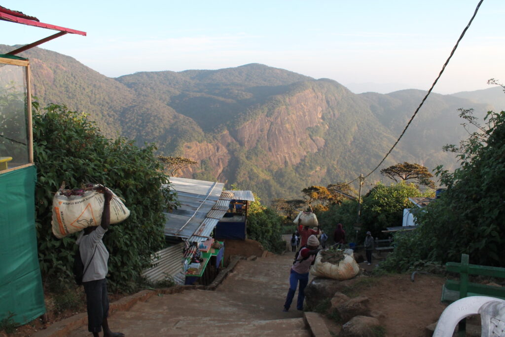 Sri Lanka locals carrying supplies