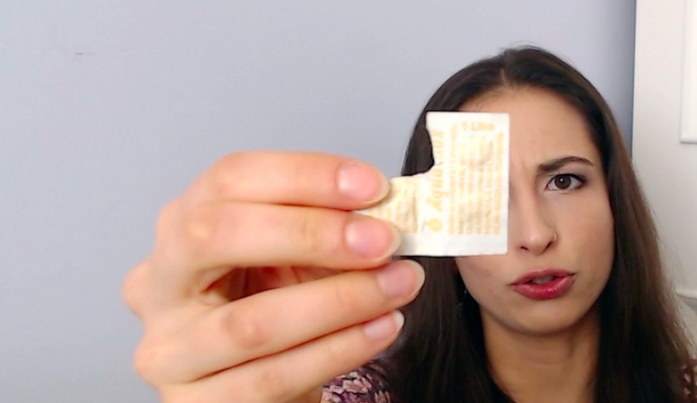 girl holding chlorine water tablets